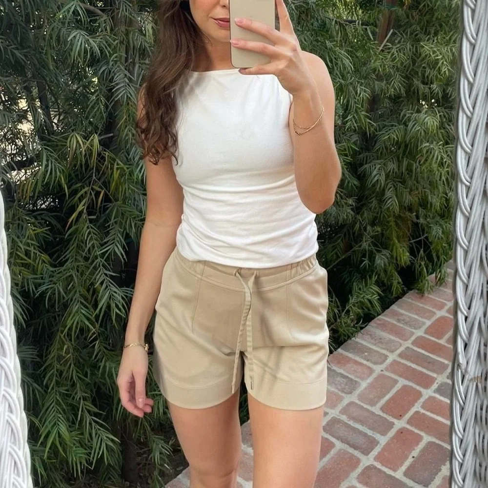 Lululemon beige casual shirts size 4 / they have a few marks